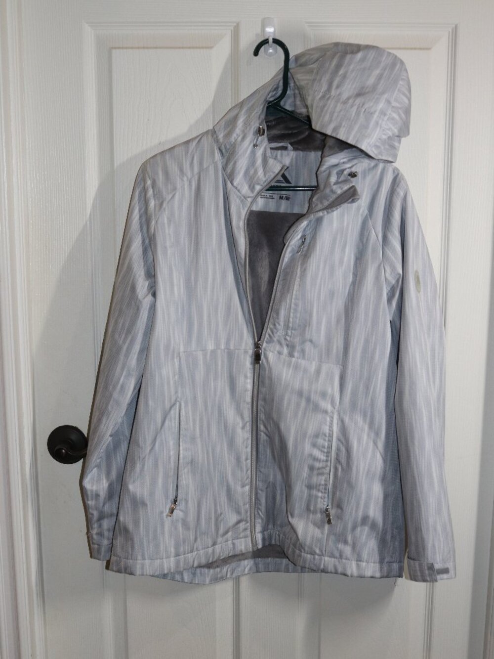 Women's ZeroXposure Medium lined hooded rain jacket.